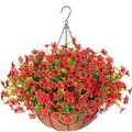 Close-up of artificial red violet flowers in a coconut palm liner hanging basket - Red