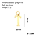 Detail view of gold plated copper letter T charm with 9mm x 6mm dimensions and 2mm hole - Letter T