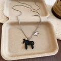 Macro detail of a vintage bead chain necklace featuring a black pony pendant in a gift box - 9# Necklace Silver Black Pony Wing