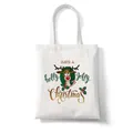 White canvas tote bag featuring reindeer print and holly jolly Christmas lettering - C10 Holly Jolly Reindeer