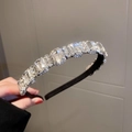 Close-up of luxury headband featuring large square crystals and pavé diamonds - Black Square