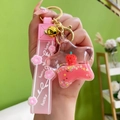Porte-clés étoile rose fraise avec dragonne en silicone lucky et clochette dorée - Forme d'étoile avec bracelet en silicone