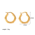 Detail view of gold hoop earrings with textured segments and 26mm diameter dimensions - Bamboo Notched Clicker Earrings