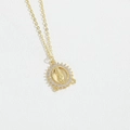 Golden Guadalupe necklace with micro-paved white zircons on a white leather background - Gold Hollow White Zirconia Lady of Guadalupe