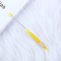Bright yellow DIY beaded pen with long metal needle tip on white plush background - 0.5mm/B / Yellow