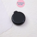 Portable round folding hairbrush with integrated mirror in classic matte black finish - Glossy - Quiet Black