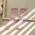 Pink cotton crew socks with sweet ruffle cuffs and delicate daisy embroidery for women - One Size / Pink