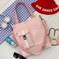 Pink canvas tote bag for women featuring dual front pockets and nice lettering - Pink