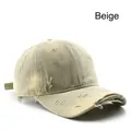 Vintage beige washed cotton baseball cap with distressed torn holes and adjustable strap - Beige