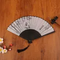 Bamboo folding fan with ink panda print and black tassel in traditional Chinese style - Panda Peace and Joy