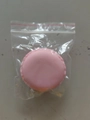 Portable macaron mini jewelry storage box in pink finish within a clear poly bag - Pink