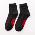 Men's black cotton socks with red New Year print and Chinese greeting characters - Crew / Black