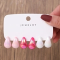 Detailed close-up of 3 pairs of teardrop-shaped acrylic earrings with iridescent finish - Pearly Pink Gradient Style (E0076-2)