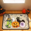 Detail of Halloween mat featuring BOO letters and spooky pumpkin icons on wood floor - Pumpkin-10