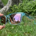 Detail view of KD332-PLUS blue translucent sunglasses with reflective mirror lenses - Transparent Light Blue / Mirrored Lens