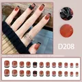 Press-on nails featuring red French gradient design with 3D black bows, set of 24 pieces - Brick Red Gradient Black Bow French (D208)