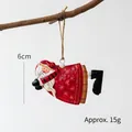 Babbo Natale di 6cm in metallo dipinto per albero di Natale con fiocchi e corda di iuta - Babbo Natale rivolto a sinistra