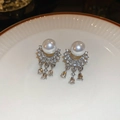 Close-up of silver tassel earrings with round pearls and sparkling pavé crystals on a plate - 37# S925 Silver Needle Earrings - Silver (White Pearl)