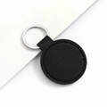 Minimalist black PU leather car keychain with silver metal ring on white background - Round / Black