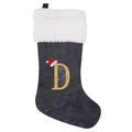 Close-up of a grey velvet Christmas stocking with a golden glitter letter D and mini Santa hat - Letter D