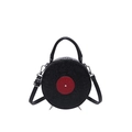 Sac à main rond style disque vintage en cuir noir avec centre rouge et motifs gaufrés - Rouge