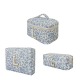 Three-piece set of blue floral quilted cotton makeup bags with gold letter L embroidery - White Orchid Design L Style