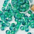 Detail view of 10mm blue and green glass beads with gold patterns for DIY jewelry making - Light Green