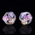 Elegant floral stud earrings with pink and purple colorful zircon stones on black background - Pink Purple Yellow