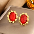 Macro detail of red cracked turquoise heart earring with textured gold-plated frame - Gold Red Turquoise E-238
