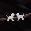 Ohrstecker aus poliertem Edelstahl in Welpen-Silhouette auf einem Zweig in Silber - Sitzender Welpe (786) / Stahlfarbe
