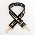 Close-up of adjustable thick shoulder strap with gold chain pattern and metal lobster clasps - Black Strap Gold Buckle
