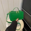 Mini suitcase-shaped crossbody bag in bright fruit green leather with top handle - Green