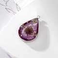 Teardrop resin pendant with purple daisy flower and gold foil in silver frame - Purple Cosmos Teardrop