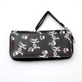 Black leather skull and rose print long wallet with a zip closure and wrist strap - Retro Skull & Rose