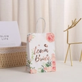 Floral kraft paper gift bag with rose gold Team Bride foil text and white rope handles - Team Bride (Lip Print & Roses)