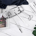 Polished silver stainless steel candle care set on tray with snuffer and wick trimmer - Silver 4-Piece Candle Tool Set