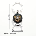 Detailed view of silver bottle opener keychain with letter N emblem and size dimensions - Letter N