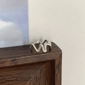 Minimalist silver heart wave ring with polished finish on elegant wooden surface - Wave Zigzag Design Ring (J4157)