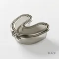Portable invisible braces case in smoke grey with secure locking latch and compact design - Black