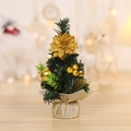Mini Christmas tree desktop ornament with gold decorations and fabric base in warm room - Gold