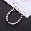 Detail showing high-polish silver metal bead chain with rings for DIY shoe charms - Silver Metal Bead Chain