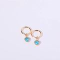 Elegant gold hoop earrings featuring vibrant heart-shaped blue gemstones for women - March / Aquamarine
