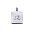 Macro detail of silver square pendant with white shell inlay and letter M engraving - Steel M