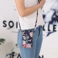 Navy floral crossbody cell phone bag for women with adjustable strap and zipper closure - Ephemeral Bloom