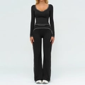Ensemble de yoga noir avec liseré blanc, haut manches longues et legging évasé chic - S / Haut Et Bas / Noir Premium