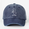 Adjustable dark blue denim baseball cap featuring an embroidered creative TEA-REX dinosaur - One Size / Navy Blue
