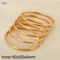 Set of five 4mm polished golden stainless steel bangles in oval open hollow design - 5 Rings (KB205313-LO)