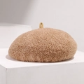 Close-up of brown wool beret featuring a fuzzy granular texture and small top loop detail - Adjustable / Camel