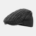 Detail of dark grey cable knit pattern and ribbed edge on a warm winter ivy cap - One Size / Dark Gray