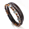 Bracelet en œil de tigre avec cuir tressé multicouche et breloques arbre de vie en métal - 21cm / Œil de tigre